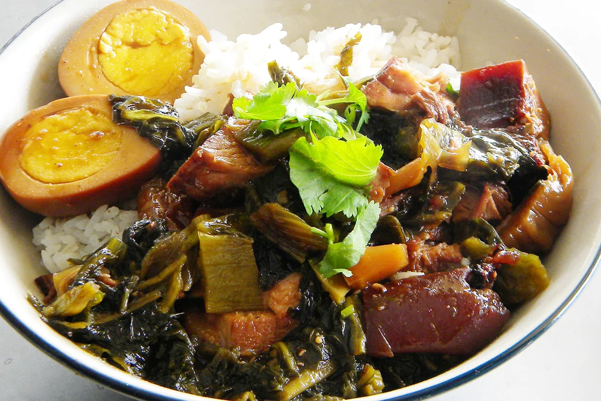 Thai stir-fried vegetables with tofu and hard-boiled eggs served over white rice