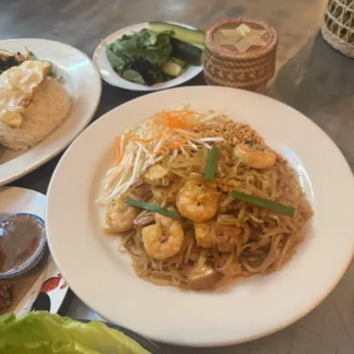 Pad Thai stir-fried rice noodles with shrimp, bean sprouts, peanuts, and lime