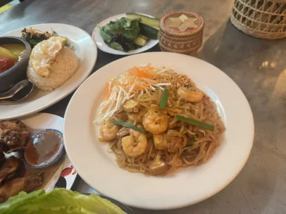 Pad Thai stir-fried rice noodles with shrimp, bean sprouts, peanuts, and lime